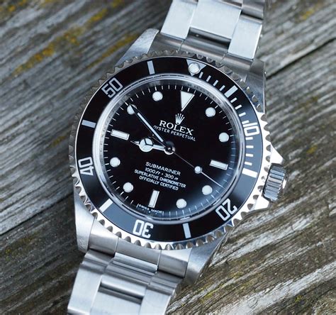 rolex submariner 14060 no date fade blue bezel|Rolex sub 14060m review.